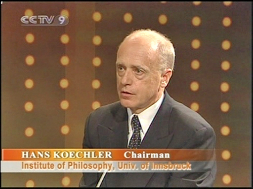 Dr. Hans Kchler talking to Yang Rui, moderator of the DIALOGUE program of CCVT, in Beijing, 2 August 2004